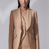 white suit/ khaki suit