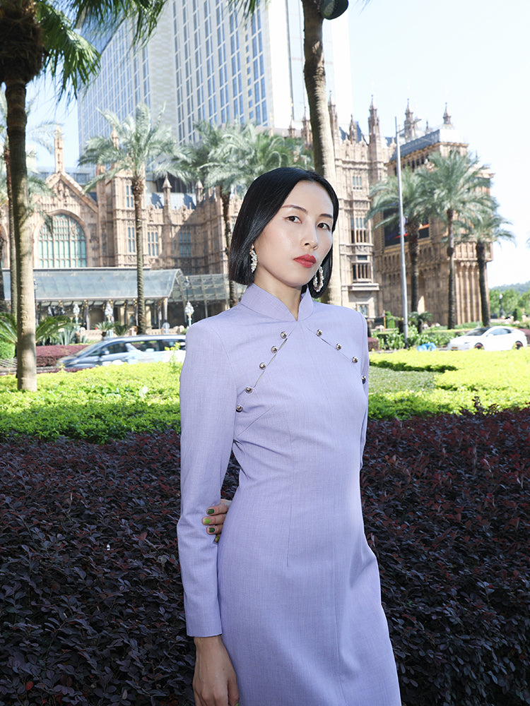 Refined lavender qipao dress with a unique swallowtail cut and contemporary styling.