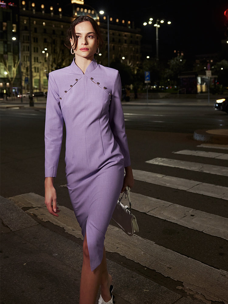 Tailored qipao dress in lavender, exuding modern elegance in an outdoor setting.