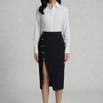 A professional woman wearing a sophisticated high-waisted black pencil skirt, featuring elegant gold-tone mandarin-style buttons and a stylish side slit for a polished executive office look.