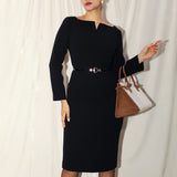 A professional woman wearing a sophisticated black long-sleeve midi dress, featuring a unique notched square neckline and a tailored slim-fit pencil silhouette for a polished executive office look.
