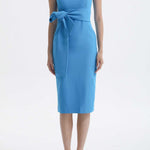 Four women showcasing an elegant v-neck sleeveless sheath dress in black, burgundy, teal green, and lavender pink, featuring a slimming tie-waist design perfect for a modern professional office look.