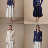 A comparison of two elegant professional looks: a navy blue pleated midi skirt and a crisp white flare skirt, both featuring sophisticated contrast-piped bow belts for a polished executive appearance.