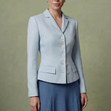 A professional woman modeling a sophisticated light blue tailored blazer with white buttons, perfectly paired with a contrasting navy blue pleated midi skirt for a refined business look.