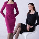 A professional woman wearing a sophisticated deep magenta long-sleeve pencil dress, featuring a unique square neckline and elegant ruched detailing at the waist for a flattering, slim-fit executive look.