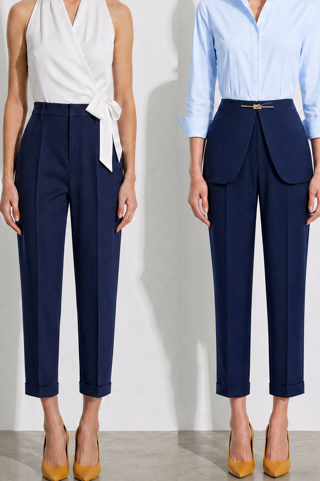 A model showcasing elegant navy blue high-waisted work trousers, featuring a unique curved overlay panel design at the waist, a slim golden metal bar buckle, pressed front creases, and chic cuffed hems, paired with a light blue button-up shirt.