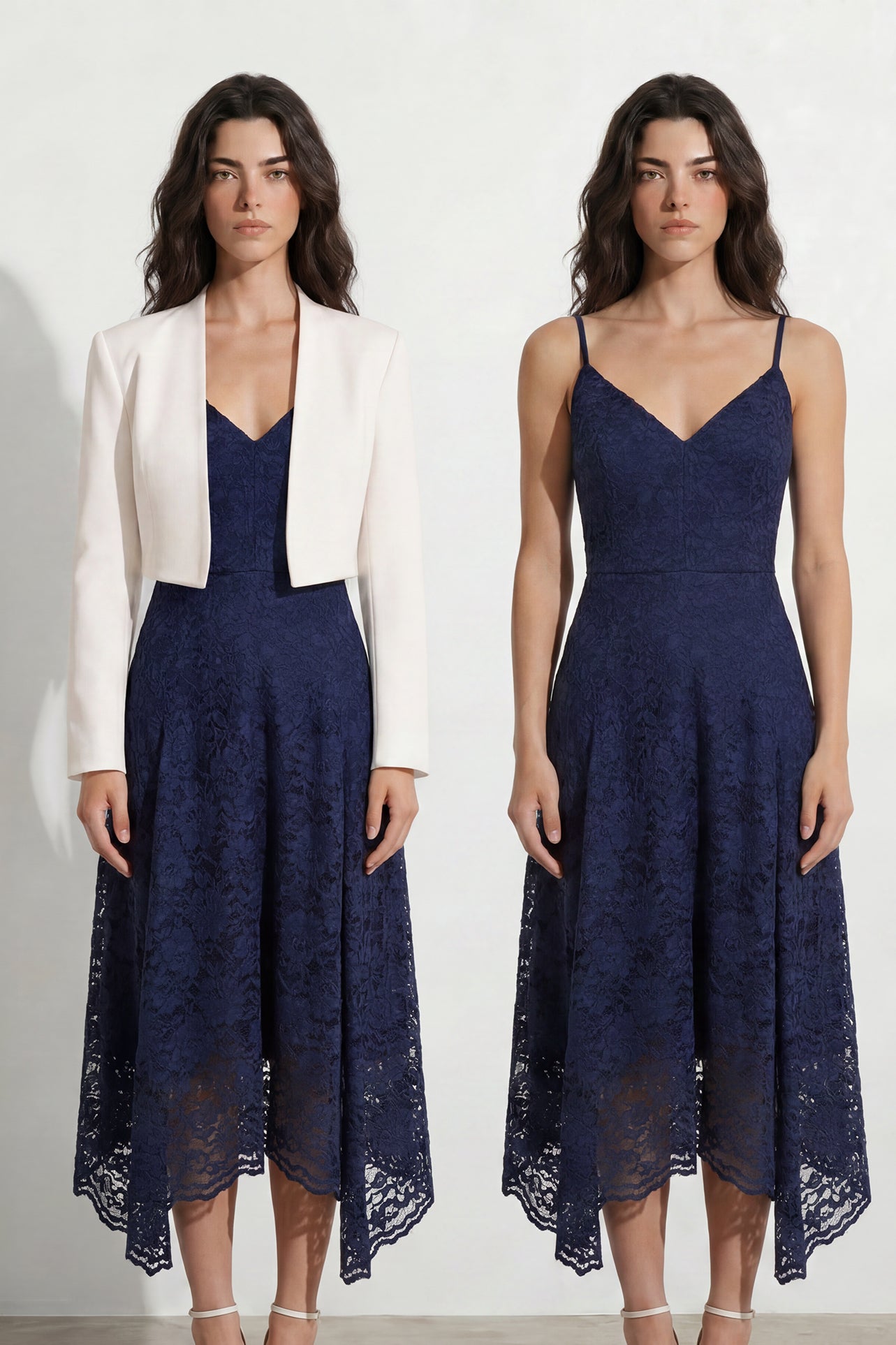 A professional woman modeling an elegant navy blue lace midi dress, featuring delicate V-neck spaghetti straps, a tailored fit-and-flare silhouette, and a beautiful flowing asymmetric handkerchief lace trim hem.