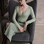 A style comparison of two elegant women's long-sleeve deep V-neck tops featuring subtle rhinestone crystal embellishments; shown on the left in nude camel tucked into tailored trousers, and on the right in pale mint green styled with a white skirt.