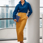 A style comparison of two elegant tailored midi pencil skirts with a sharp front slit; the left showcasing a vibrant royal blue high-waisted skirt paired with a striped shirt, and the right featuring a rich mustard yellow version paired with a bright orange blouse
