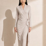A style comparison of two elegant women's long-sleeve V-neck wrap maxi dresses featuring a flattering side-tie waist and cascading draped ruching; shown on the left in soft oatmeal greige and on the right in rich burgundy wine.
