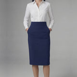 An elegant professional woman wearing a high-waisted navy blue pencil skirt featuring a slim fit, functional side pockets, and a wide waistband for a polished office look