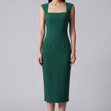 A professional woman wearing a sophisticated emerald green sleeveless dress, featuring a classic square neckline and a flattering tailored sheath silhouette for an elegant executive look.