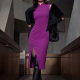 A professional woman in a high-fashion pose wearing a sophisticated purple modern qipao, featuring a classic mandarin collar, sleeveless slim-fit design, and elegant side-fastening buttons with a front slit for a modern oriental look.