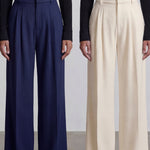 Comparison of elegant navy blue and ivory cream high-waisted wide-leg trousers, featuring sophisticated pleated front details and a tailored relaxed fit for professional office wear.