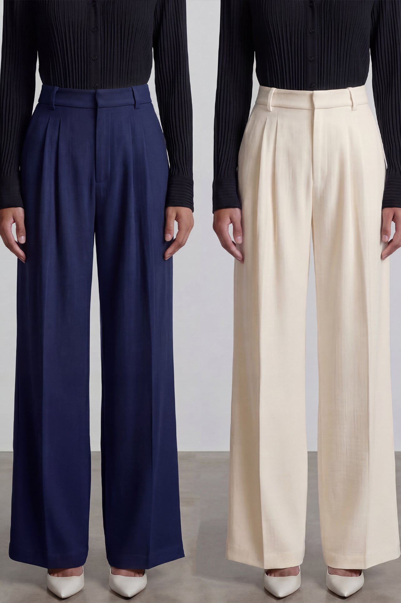 Comparison of elegant navy blue and ivory cream high-waisted wide-leg trousers, featuring sophisticated pleated front details and a tailored relaxed fit for professional office wear.