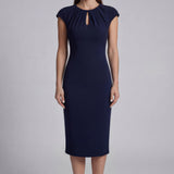 A professional woman wearing a sophisticated navy blue midi dress, featuring an elegant pleated neckline with a subtle keyhole detail and a tailored slim-fit pencil silhouette for a polished executive look.