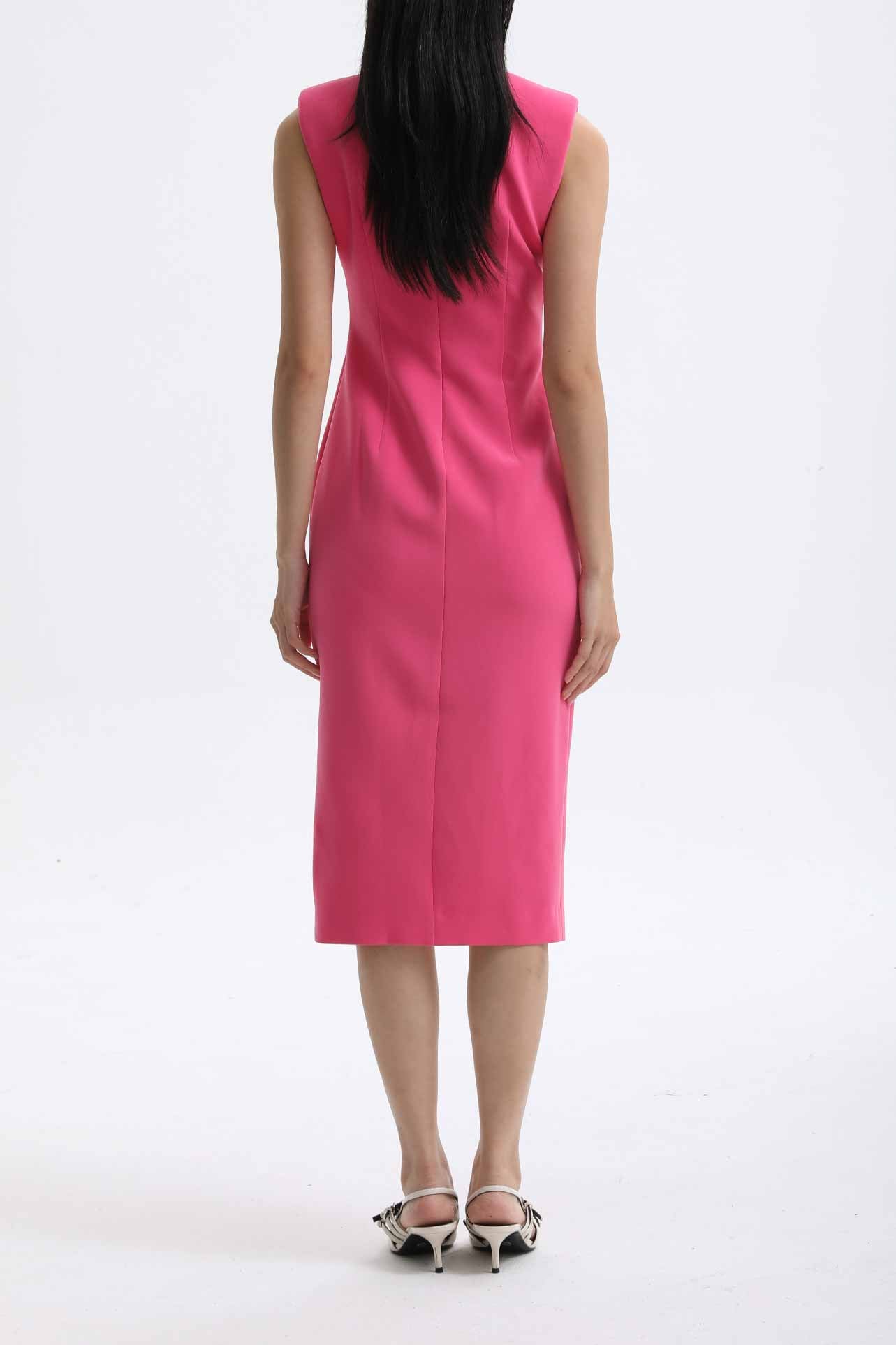 A professional woman wearing a vibrant hot pink modern qipao dress, featuring a classic mandarin collar, sleeveless design, and elegant gold button side-fastening with a sophisticated slit for an oriental chic look.