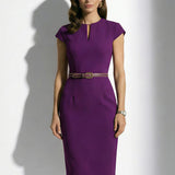 A professional woman modeling an elegant deep purple sheath dress, featuring a sophisticated keyhole neckline, cap sleeves, and a slim waist belt for a polished executive office look.