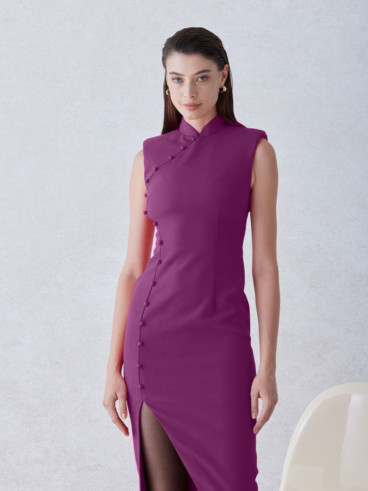A professional woman wearing a stunning magenta purple sleeveless dress, featuring a traditional mandarin collar, a row of elegant side buttons, and a sophisticated high slit for a modern oriental look.