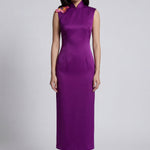 A professional woman wearing a stunning purple satin sleeveless dress, featuring a traditional mandarin collar and delicate floral embroidery on the shoulder for a modern oriental-inspired formal look.