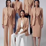 A professional woman wearing a sophisticated apricot-colored tailored vest, featuring a deep V-neckline and a unique pointed hem for an elegant executive office look.