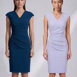A style comparison of two elegant professional midi dresses with short cap sleeves; the left showcasing a sophisticated teal blue tailored sheath dress with a V-neckline and refined side ruching, and the right featuring the same slimming draping design in a soft pastel lavender lilac color.