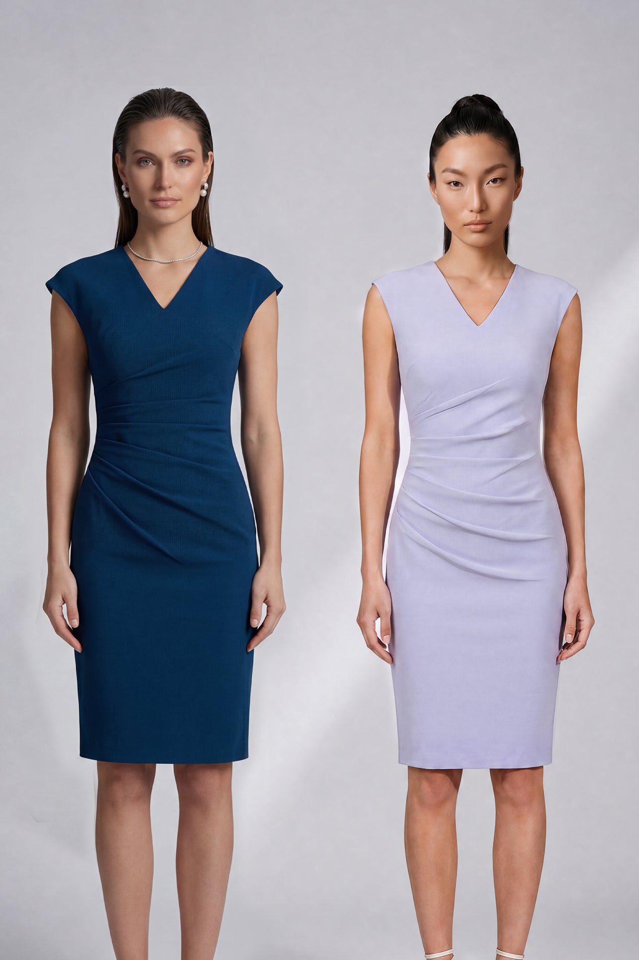 A style comparison of two elegant professional midi dresses with short cap sleeves; the left showcasing a sophisticated teal blue tailored sheath dress with a V-neckline and refined side ruching, and the right featuring the same slimming draping design in a soft pastel lavender lilac color.