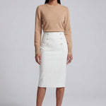 A professional woman wearing a sophisticated high-waisted white pencil skirt featuring elegant double-breasted button decorations and a slimming tailored fit, ideal for corporate business wear.