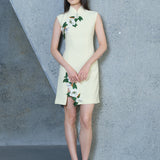 A professional woman wearing a stunning lemon yellow sleeveless mini dress, featuring a traditional mandarin collar, exquisite white floral 3D embroidery, and an elegant side slit for a sophisticated modern oriental look.