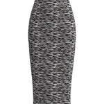 A woman wearing a glamorous high-waisted pencil skirt featuring shimmering silver and black sequins in a stylish zebra print, ideal for an elegant evening party or a night out.