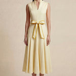 A side-by-side comparison of an elegant pale yellow sleeveless dress in two lengths, featuring a sophisticated mandarin collar, a stylish bow tie-waist, and a pleated A-line skirt for a classic feminine look