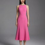 A professional woman wearing an elegant bright pink sleeveless midi dress, featuring a sophisticated round neckline and a feminine flared mermaid-style hem for a polished summer look.