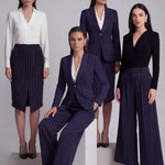 Navy blue pinstripe pencil skirt for women, professional business attire with front slit detail.