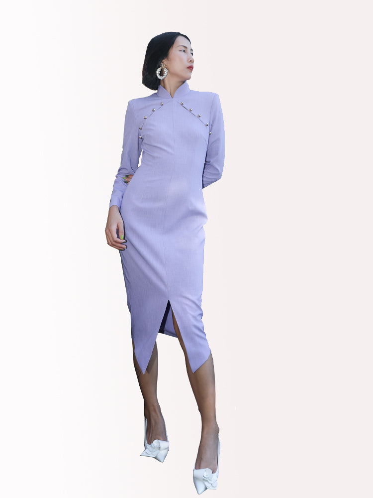 Elegant tailored qipao dress with a modern twist, showcased in an urban setting.