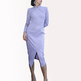 Elegant tailored qipao dress with a modern twist, showcased in an urban setting.