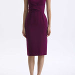 A professional woman wearing a sophisticated magenta v-neck sleeveless midi dress, featuring a tailored slim-fit pencil silhouette for a polished executive office or cocktail look.