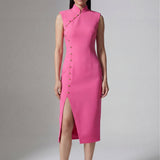 A professional woman wearing a vibrant hot pink modern qipao dress, featuring a classic mandarin collar, sleeveless design, and elegant gold button side-fastening with a sophisticated slit for an oriental chic look.
