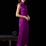 A professional woman wearing a stunning purple satin sleeveless dress, featuring a traditional mandarin collar and delicate floral embroidery on the shoulder for a modern oriental-inspired formal look.