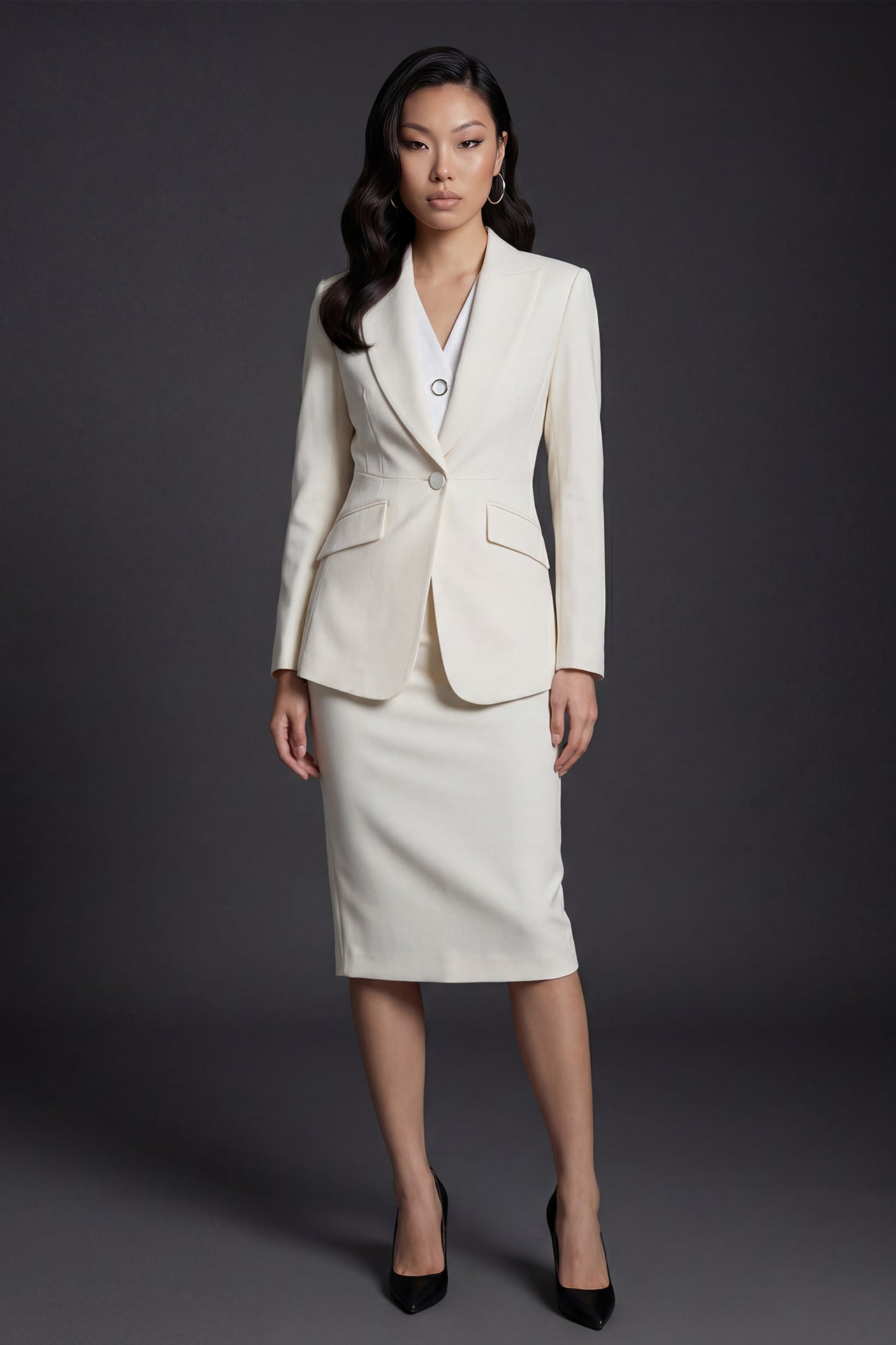 A professional woman wearing a sophisticated black belted blazer dress, featuring a tailored slim-fit silhouette with a waist-defining belt for a powerful executive business look.