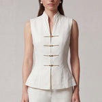 A professional woman modeling stylish high-waisted wide-leg trousers in a classic black pinstripe pattern, featuring sophisticated front pleats and a flattering long-line silhouette for an elegant office look.