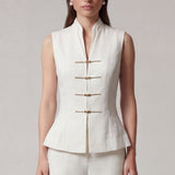 A professional woman modeling stylish high-waisted wide-leg trousers in a classic black pinstripe pattern, featuring sophisticated front pleats and a flattering long-line silhouette for an elegant office look.