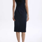 A professional woman wearing a sophisticated navy blue midi dress, featuring an elegant pleated neckline with a subtle keyhole detail and a tailored slim-fit pencil silhouette for a polished executive look.