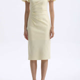 A professional woman wearing a sophisticated pale yellow short-sleeve midi dress, featuring elegant puff sleeves and a slimming ruched waistline for a polished and fresh summer office look.