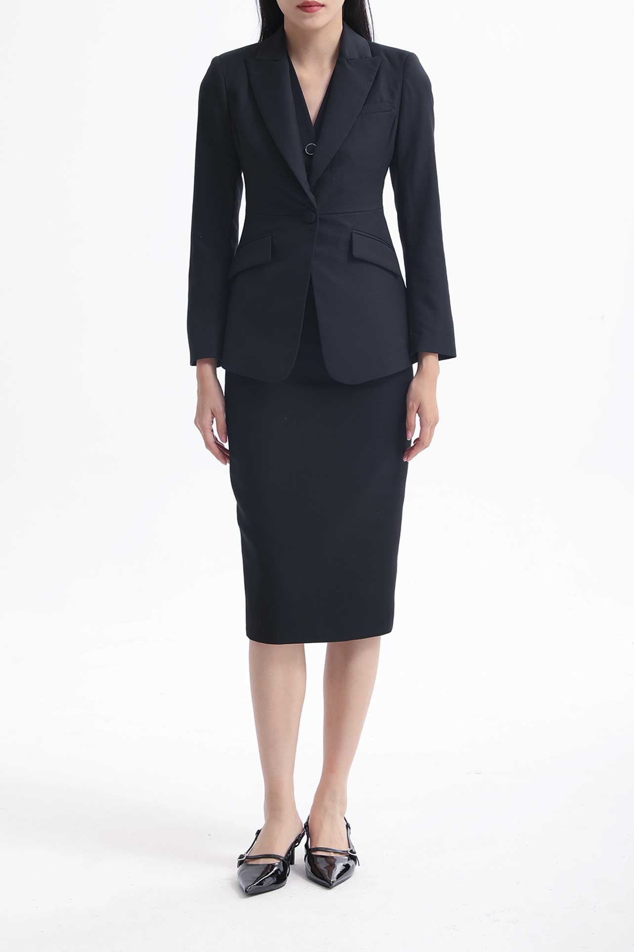 A professional woman wearing a sophisticated black belted blazer dress, featuring a tailored slim-fit silhouette with a waist-defining belt for a powerful executive business look.