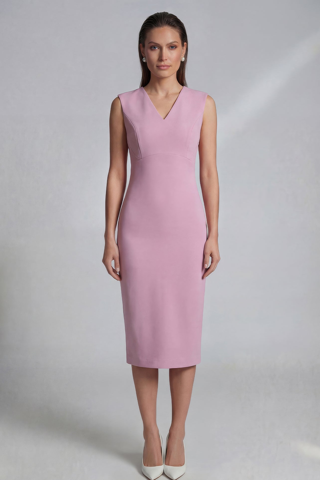 Four women showcasing an elegant v-neck sleeveless sheath dress in black, burgundy, teal green, and lavender pink, featuring a slimming tie-waist design perfect for a modern professional office look.