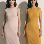 A professional woman modeling an elegant mustard yellow sleeveless sheath dress, featuring a sophisticated crew neckline and a tailored slim fit with princess seams for a polished executive look.