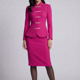 A professional woman wearing a sophisticated beige modern Qipao-inspired skirt suit, featuring a tailored blazer with traditional Chinese frog buttons and a stand collar for an elegant executive office look.