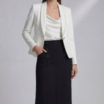 A professional woman wearing a sophisticated high-waisted white pencil skirt featuring elegant double-breasted button decorations and a slimming tailored fit, ideal for corporate business wear.