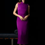 A professional woman wearing a stunning purple satin sleeveless dress, featuring a traditional mandarin collar and delicate floral embroidery on the shoulder for a modern oriental-inspired formal look.