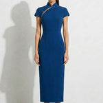 A collection of four professional models of different ages wearing elegant royal blue dresses featuring modern Chinese elements, including mandarin collars, traditional knot buttons, and diverse silhouettes from sleek sheaths to pleated A-line skirts.